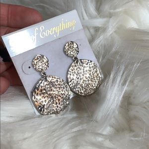 Silver disc drop earrings. Hammered texture